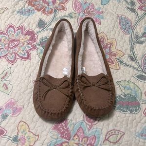 Brown moccasin slippers